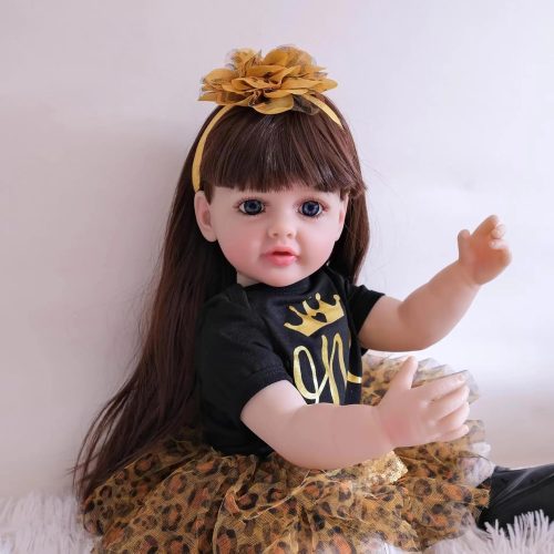 Realistic silicone baby girl doll wearing a black and leopard print dress with a matching headband