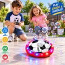 Retail packaging box for the PRO KIDS R/C Soccer Bubble Car, displaying a 2.4GHz remote control, floating bubbles, and two hovering disc-shaped cars: one with a soccer ball pattern and another with a colorful geometric design. The box indicates it features lights and music and is intended for ages 4+.
