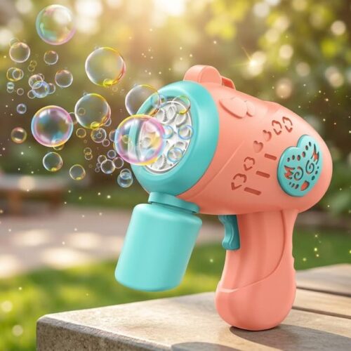 Retail packaging box for the CooCoo Color Bubble Gun. The blue box displays a pink and teal automatic bubble maker surrounded by floating bubbles, highlighting key features like Type-C charging, Light, Music, "Blowing lots of bubbles," and an age 3+ rating.
