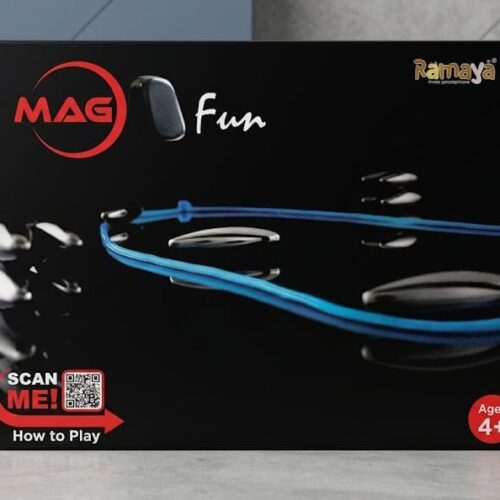 Black retail box for the Ramaya MAG Fun magnetic game featuring an illustration of shiny, irregular magnetic stones and a blue string, with an "Ages 4+" rating and a "SCAN ME! How to Play" QR code printed on the front.
