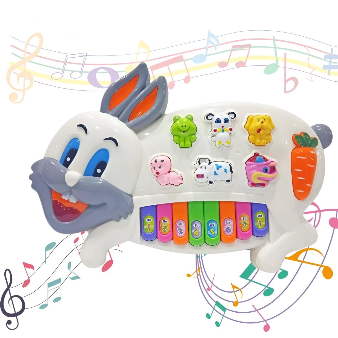 A white plastic musical toy shaped like a rabbit, featuring 8 colorful piano keys along the bottom, a carrot-shaped mode key, and six interactive character buttons shaped like a child, frog, sheep, cow, dog, and duck. Text at the top reads "RABBIT PIANO - Safe & Healthy Materials".