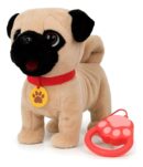 A plush pug dog toy with a black face and beige body, wearing a red collar with a yellow paw print tag, standing next to a red paw-shaped remote control attached by a leash wire.