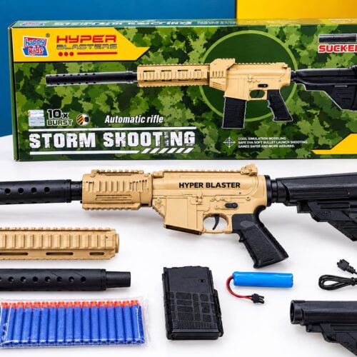 Retail box and unpacked contents of the Happy Kids Hyper Blasters Storm Shooting automatic toy rifle. The display includes a tan and black modular toy gun, a detachable magazine, a rechargeable blue battery, a USB charging cable, interchangeable barrel parts, and a pack of 20 blue EVA soft darts with orange suction cups.