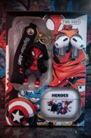 Retail packaging for the TWS-R201 wireless earbuds, showcasing white silicone-tipped earbuds, a white charging case printed with the word "HEROES" and comic characters, and a rubber Spider-Man keychain figure wearing a black hoodie attached to a black lanyard strap